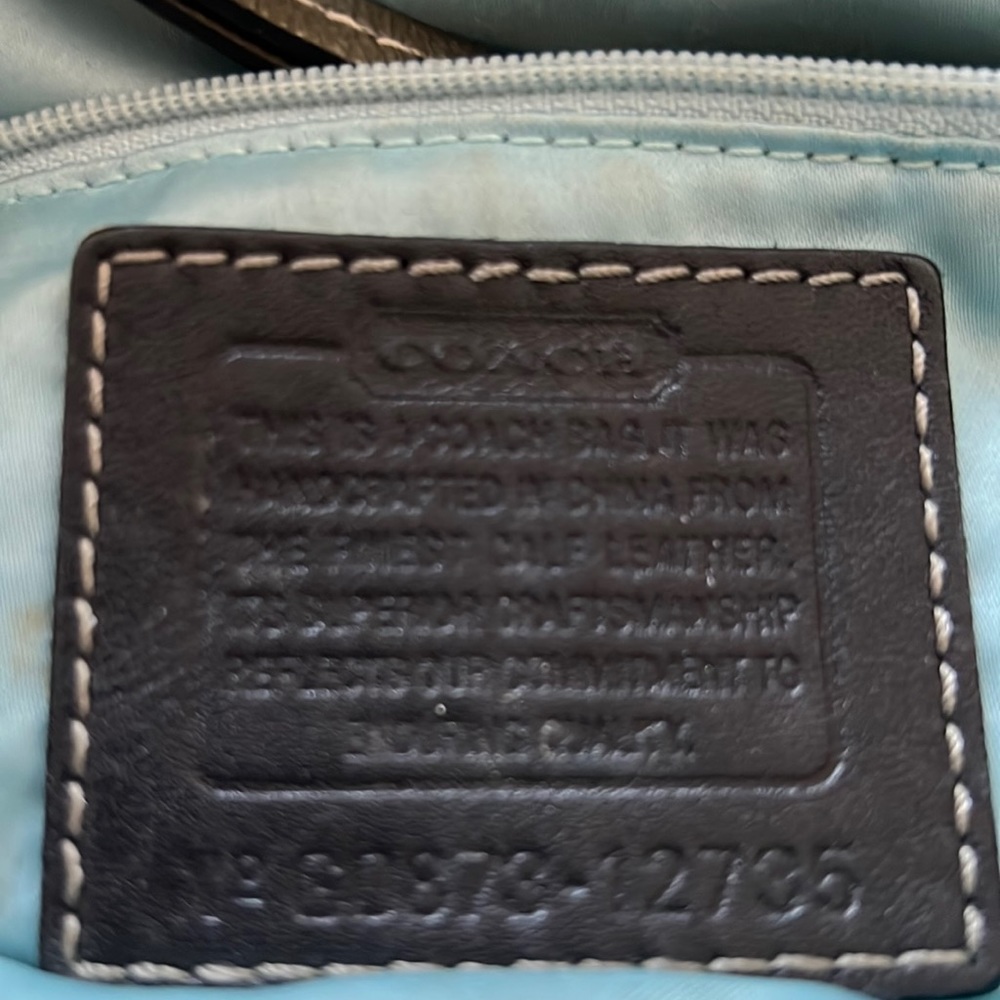 Coach Purse, light gray in color, from a non-smoking pet free home